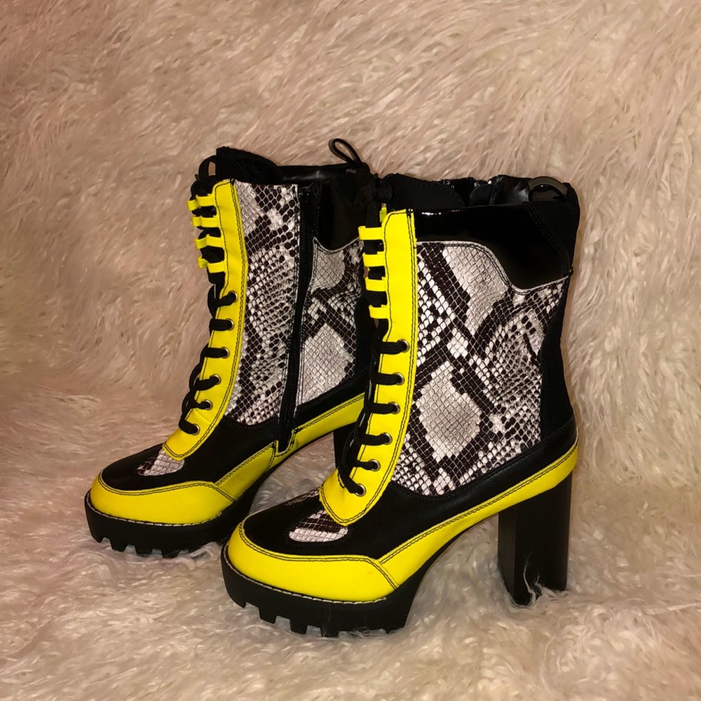 snake print platform boots with neon yellow trim